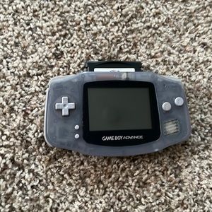 Game boy advance with light and 1 game.